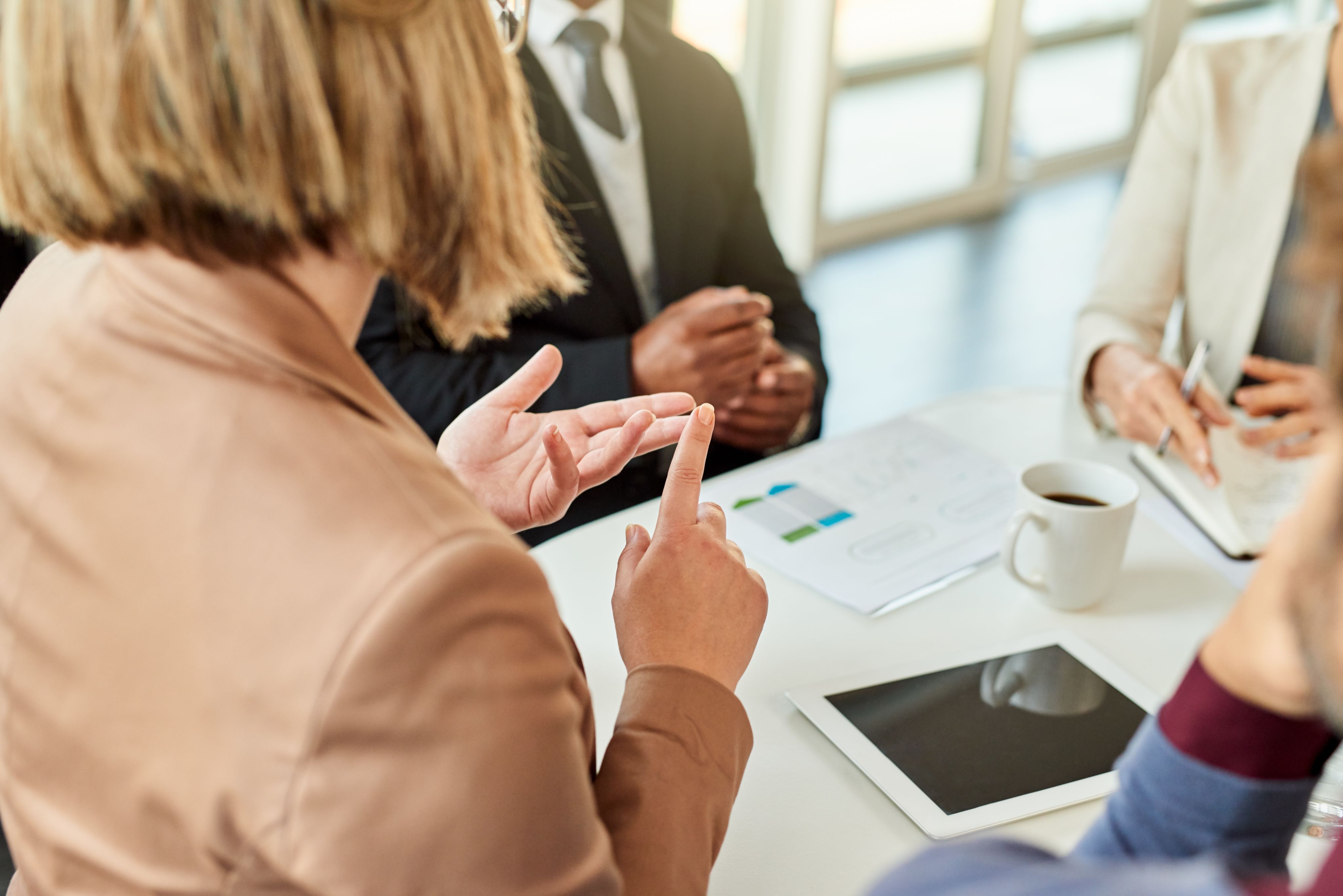 Women sat in a business meeting